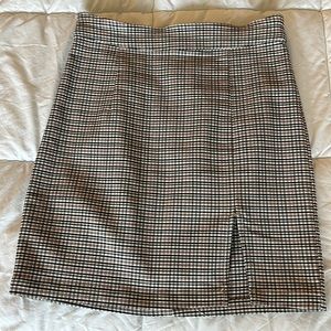 Garage mini skirt with thigh slit. Size XS